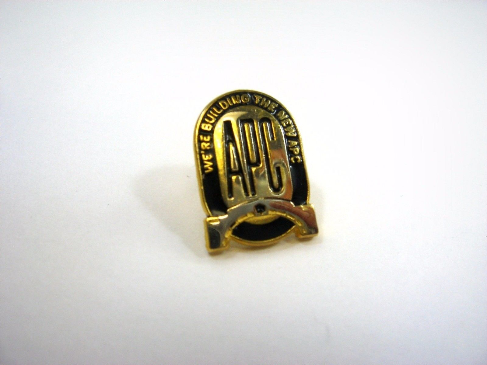 Vintage Collectible Pin: APC We\'re Building the New APC
