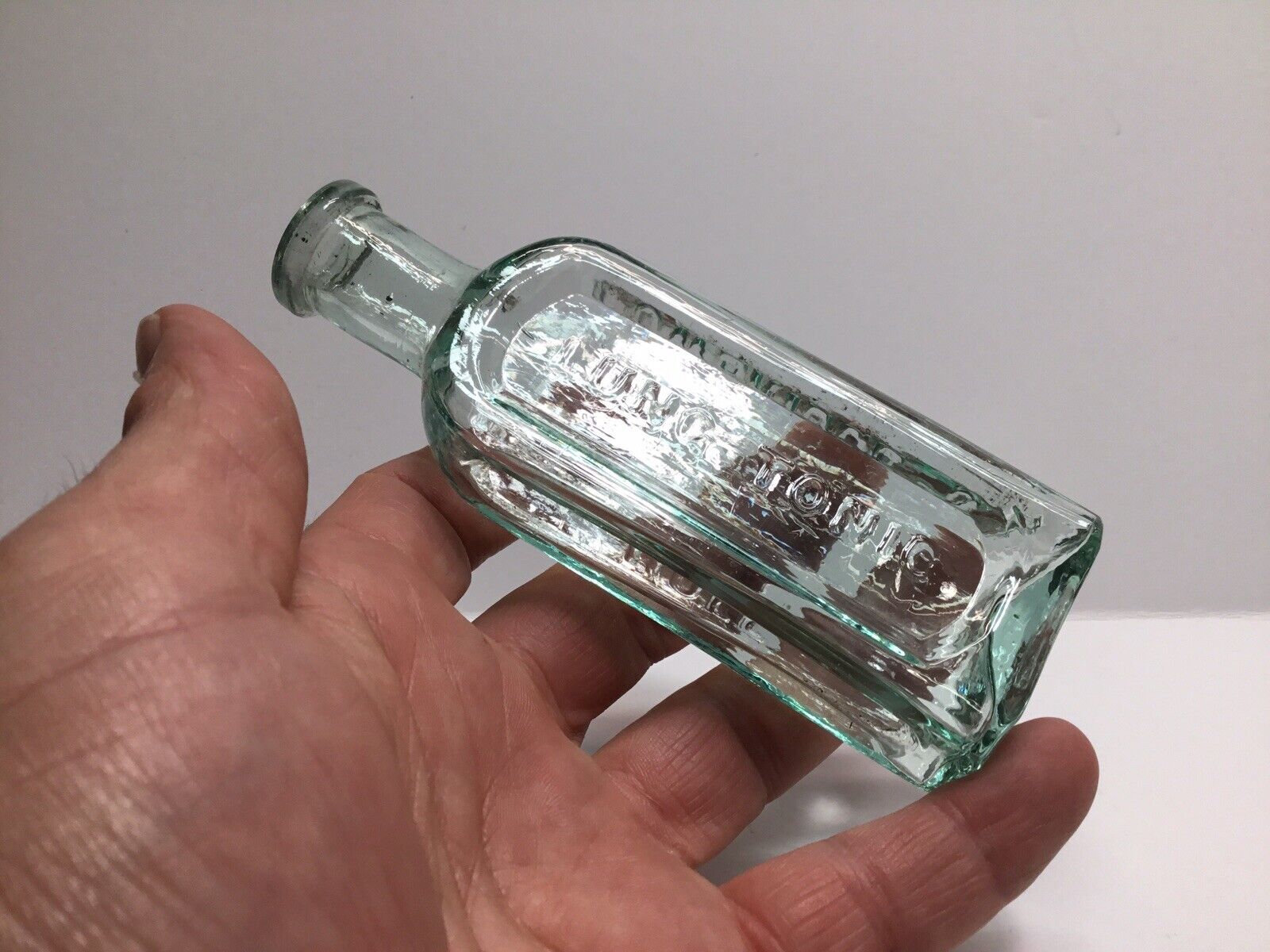 Antique Aqua Colored Lung Tonic Medicine Bottle.