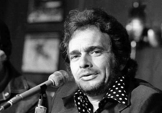 Merle Haggard 1970's sitting in front of microphone during press interview 8x10