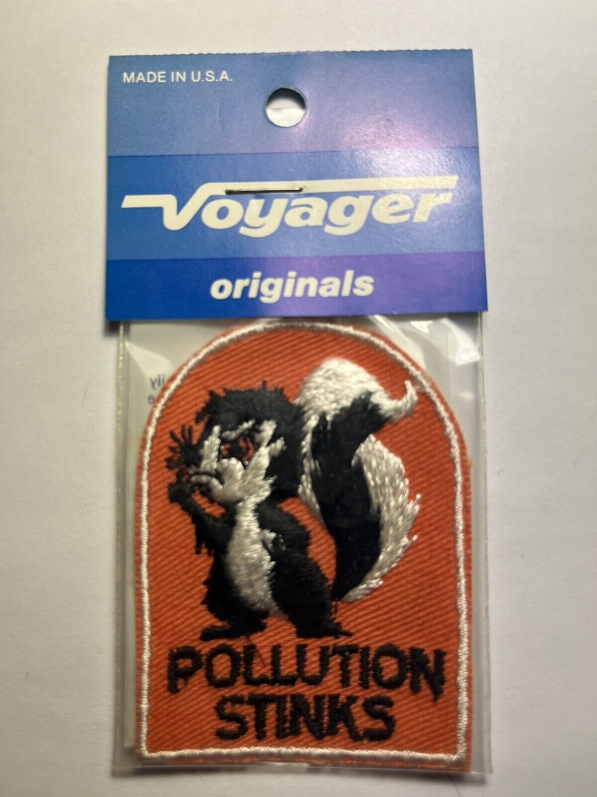 Vintage Voyager Originals POLLUTION STINKS Skunk Holding Nose Iron On Patch NIP