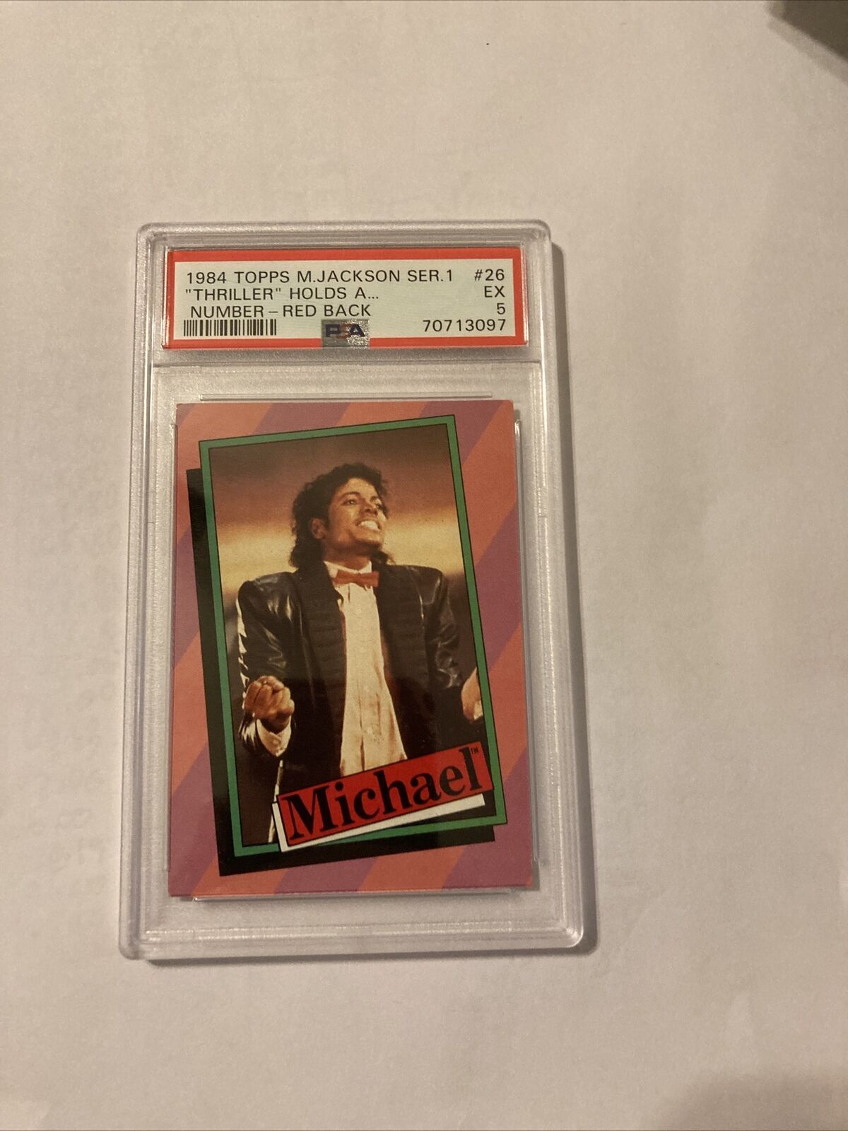 1984 Topps Michael Jackson series 1 “Thriller “  holds a number.. #26 PSA 5
