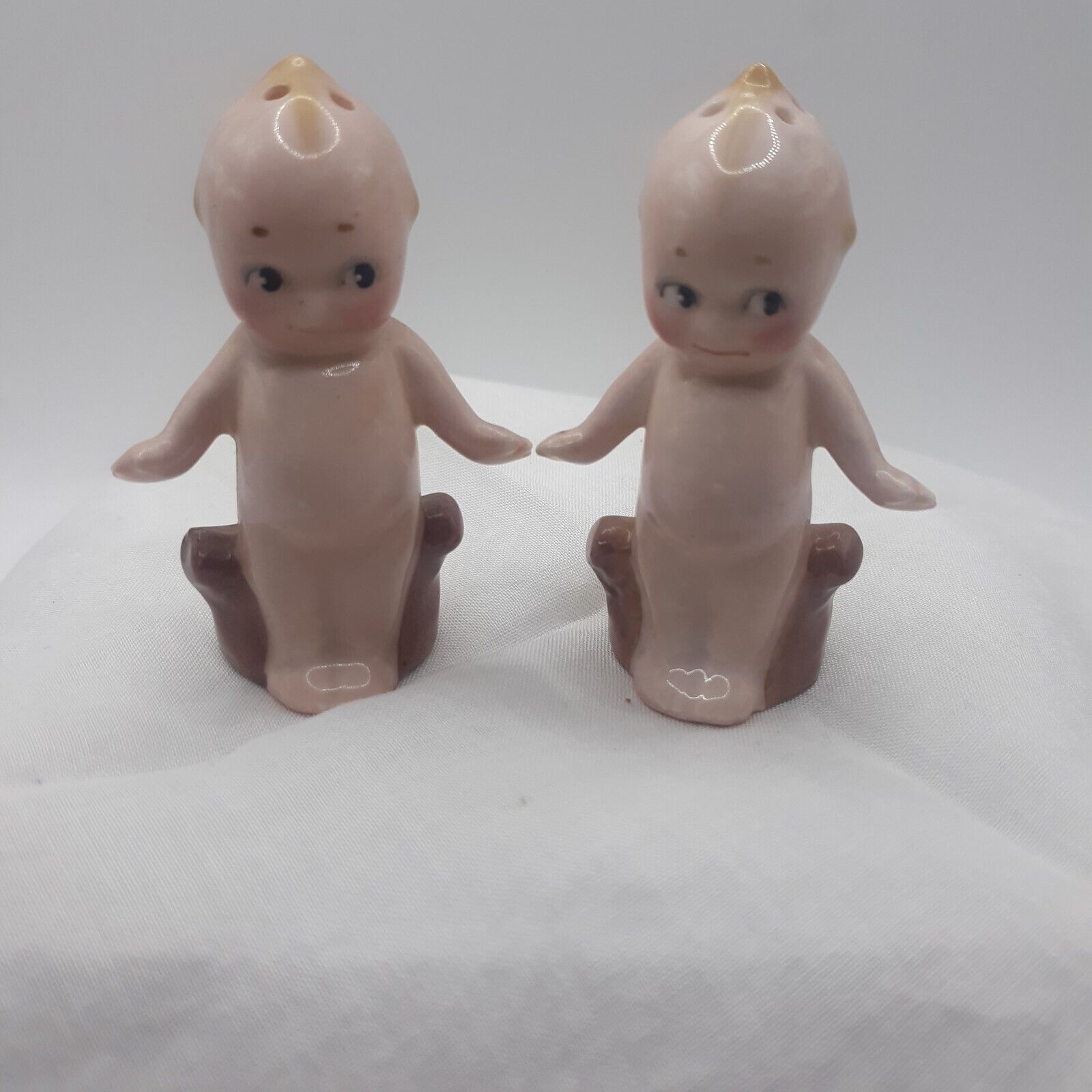 Vintage Rose O\'Neill Kewpie Salt and Pepper Shakers Standing With Stump 1913