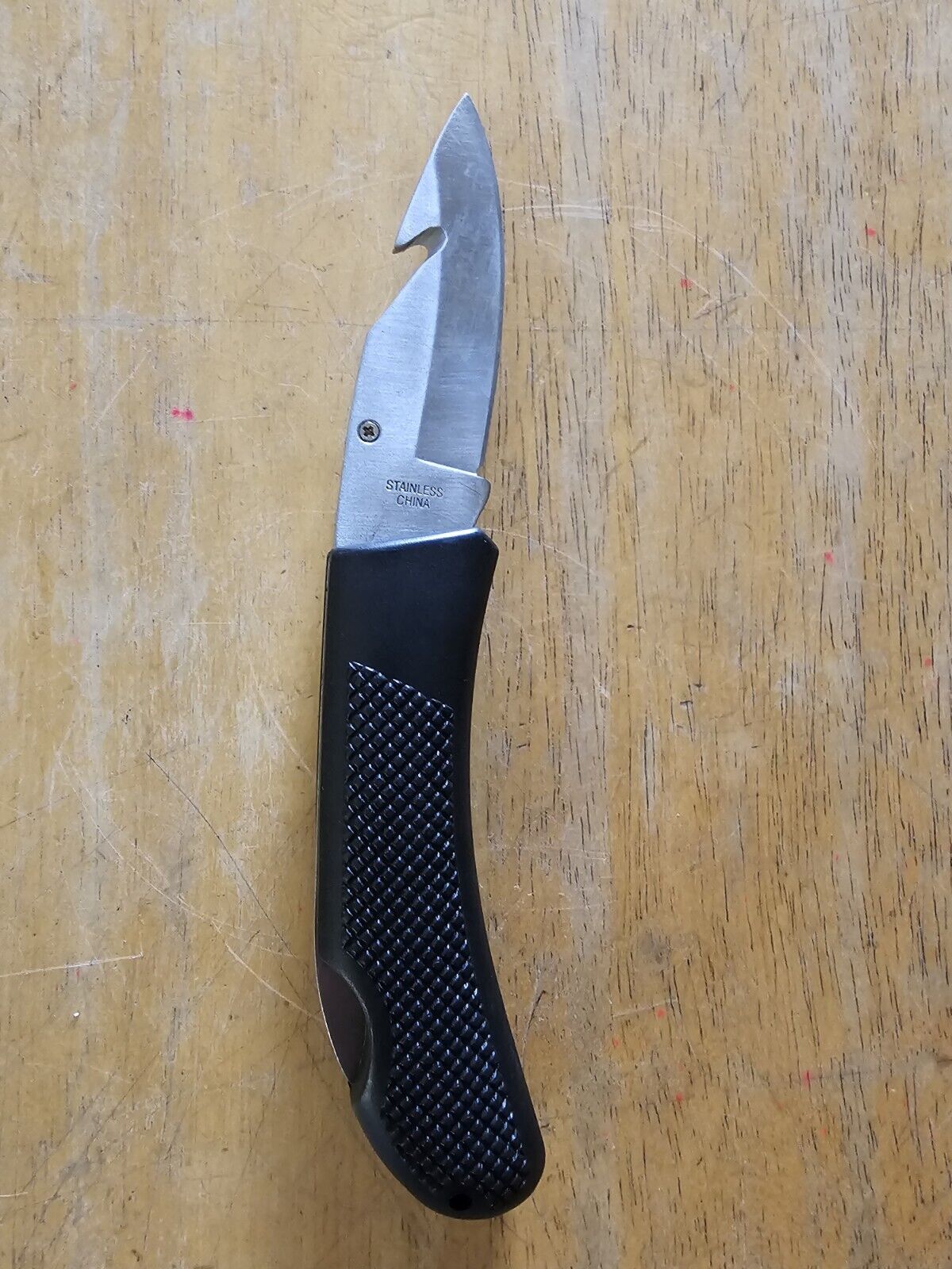 RIDGE RUNNER RUBBER HANDLE FOLDING KNIFE; 3 1/2 Inch Blade