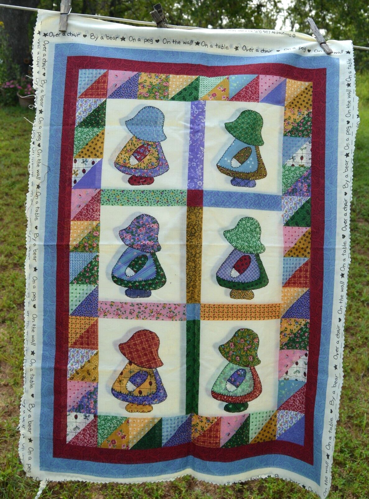 Holly Hobbie faux-quilt panel for making wall hanging or crib bedding