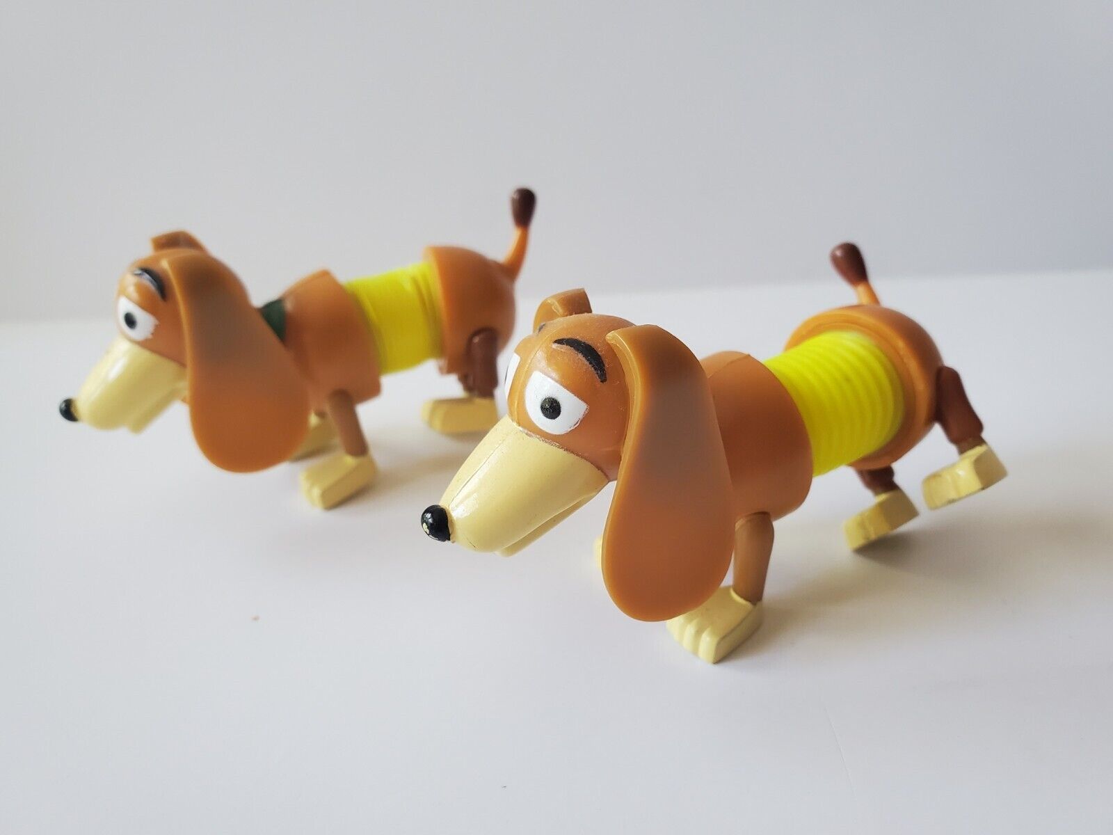 RARE Poof Slinky Inc Dachshund DOGS 2005 Yellow Plastic Spring Toy Story Figure