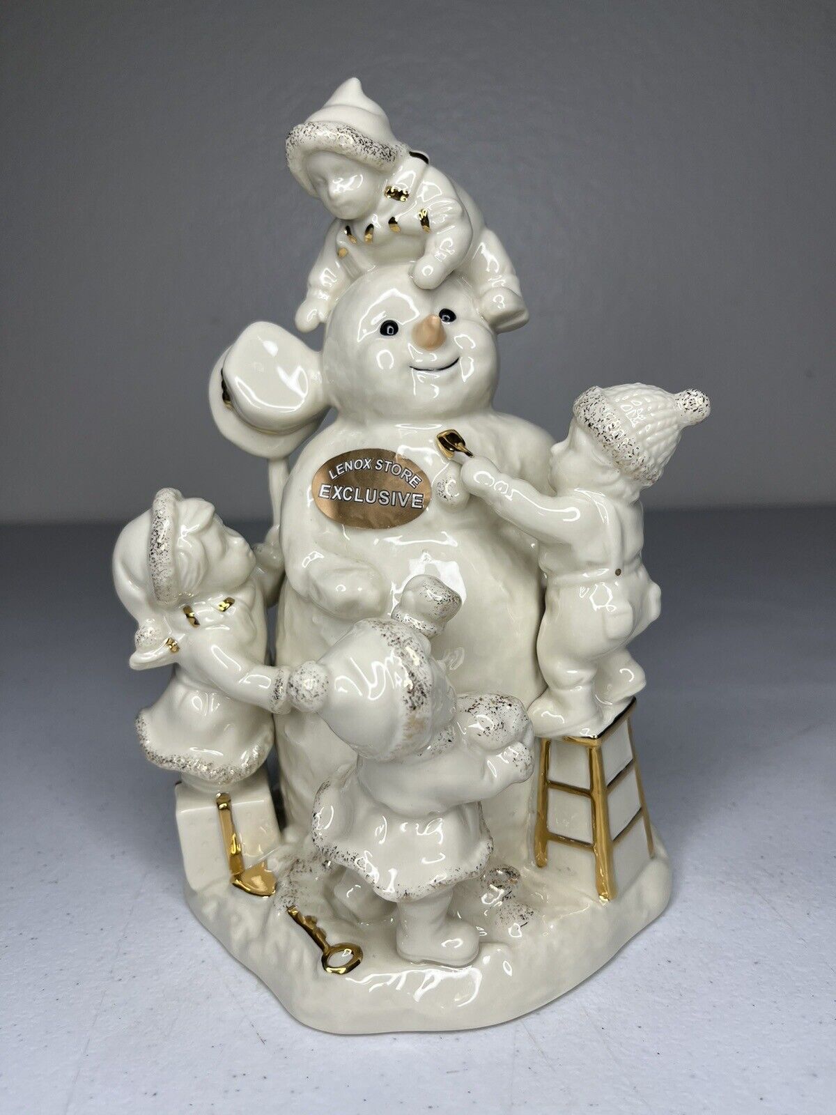 Lenox Winter Wonderland: Porcelain Snowman & Children - Festive Elegance