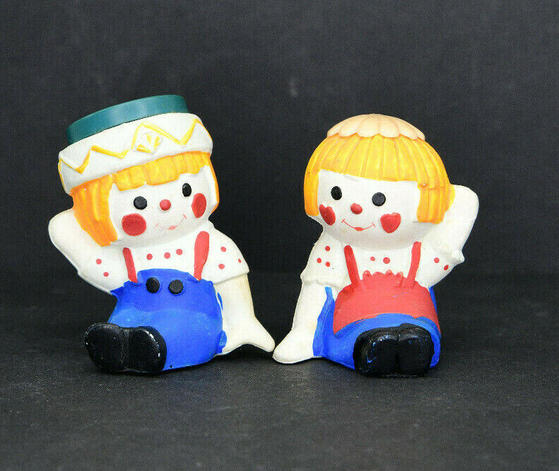 Vintage Plastic Raggedy Ann And Andy Sitting and Waving Salt And Pepper Shakers