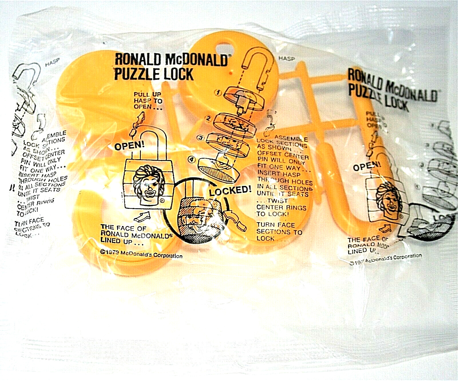 1979 Ronald McDonalds Yellow Plastic Puzzle Lock Happy Meal Toy NOS New MIP