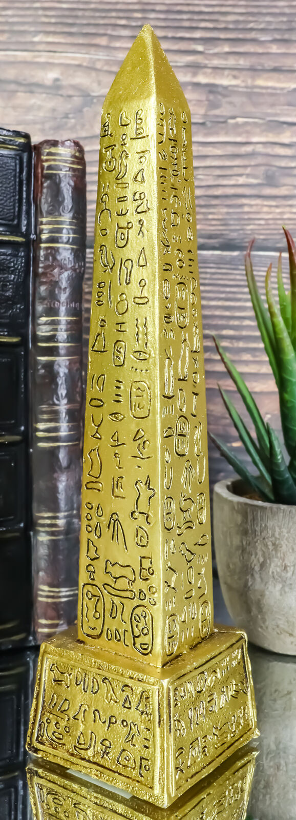 Gods Of Egypt Temple of Ra Gold Colored Luxor Obelisk With Hieroglyphs Statue
