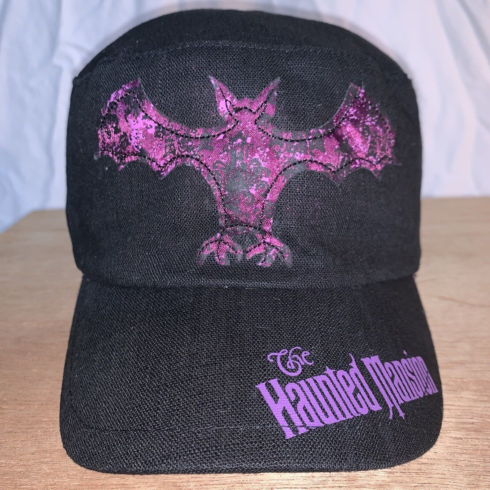 Disney Parks Haunted Mansion “Bat” Logo Fitted Hat. Purple Satin On Inside. $25.