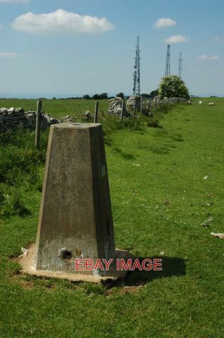 PHOTO  TRIG POINT ON CLEEVE HILL THIS TRIG POINT IS 330M ABOVE SEA LEVEL AND THE