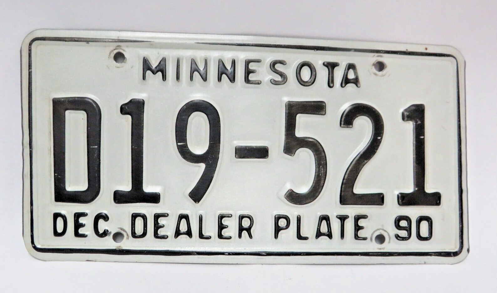 Dec. 1990 Minnesota Base Dealer License Plate D19-521