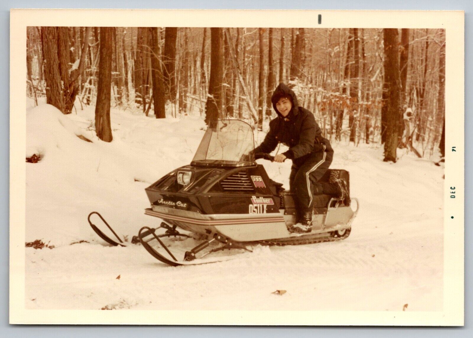 pretty girl on Arctic cat black panther snowmobile Vintage Snapshot Photo 1971