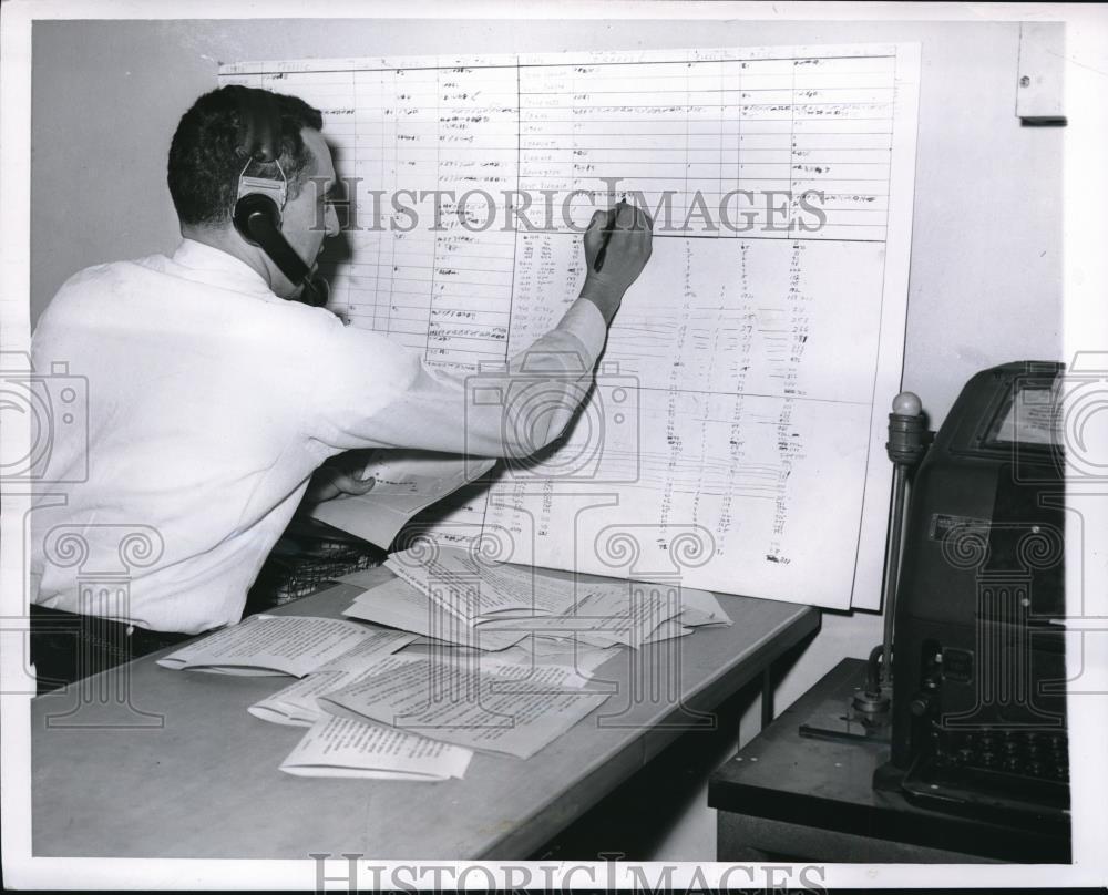 1955 Press Photo Paul Sisco United Press Staffer Calculates Traffic Fatalities