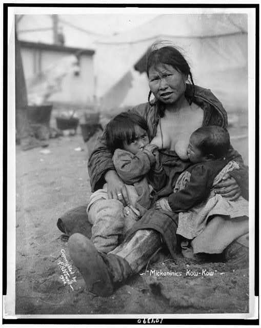 Mickaninies Kow-Kow,women,children,breast feeding,mothers,Eskimos,Inuits,c1904