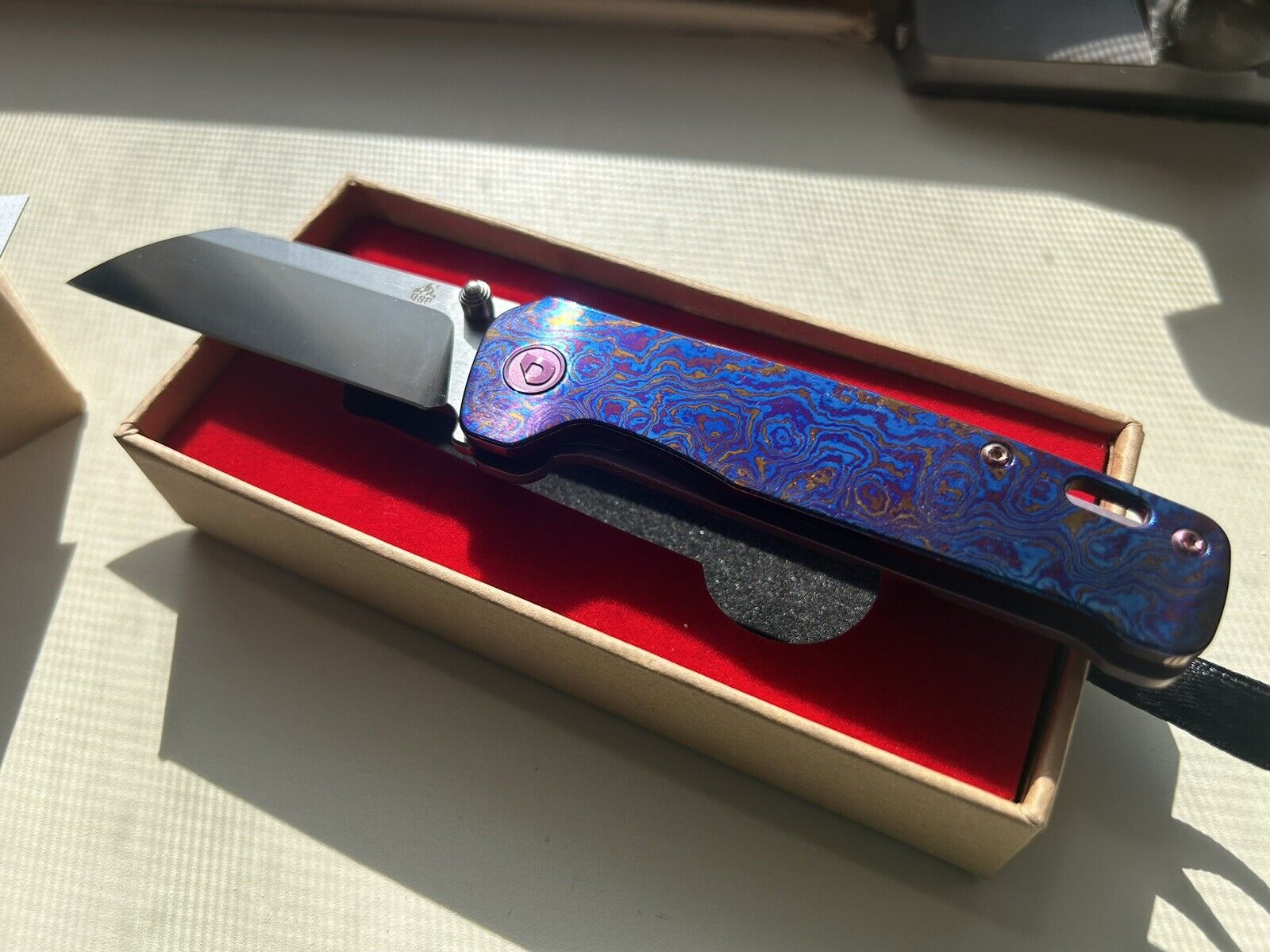 Kaviso X QSP Penguin Mokuti/Titanium Framelock S35VN Satin Blade Knife