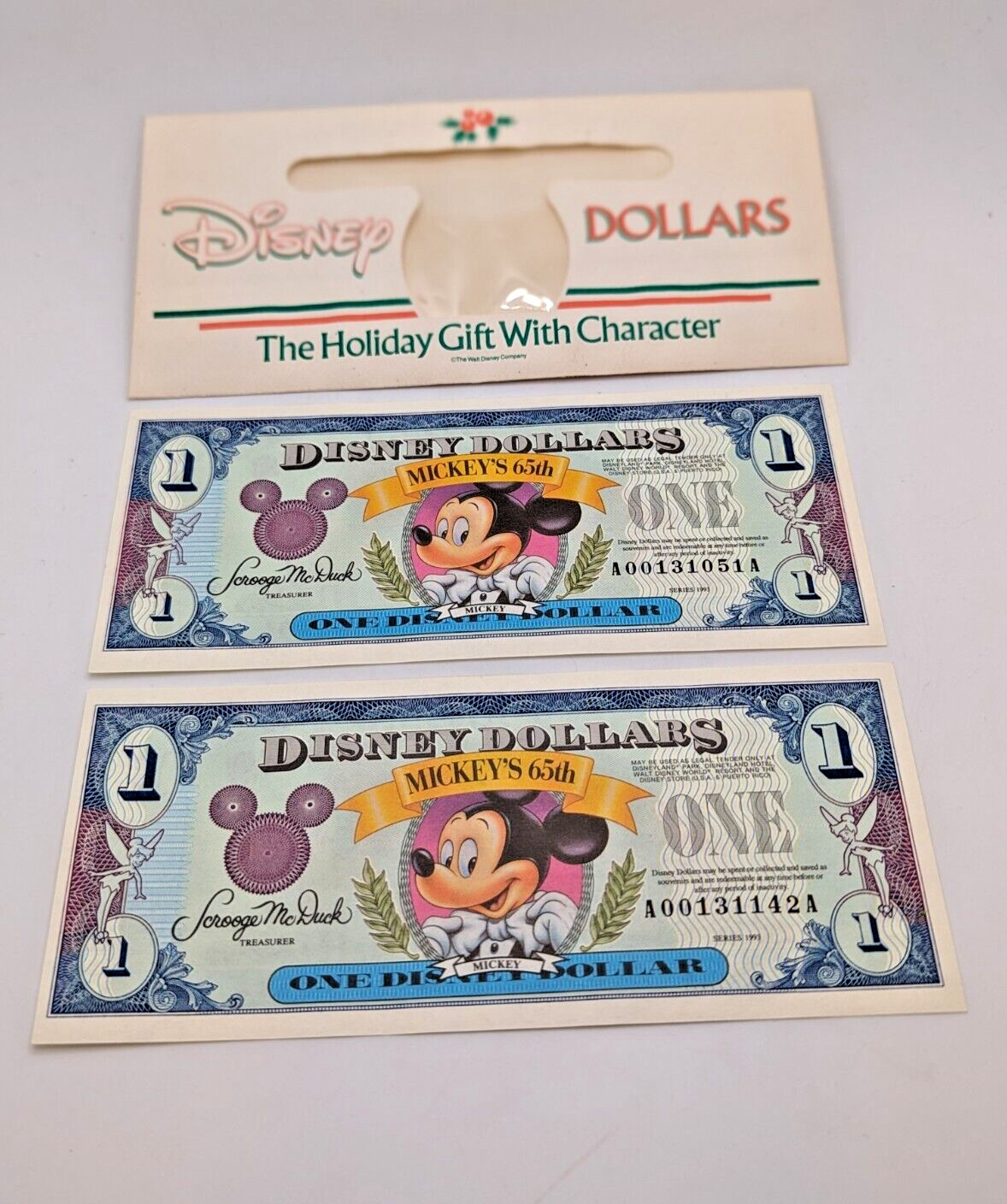 MINT 65th - 1993 Walt Disney Money 2 - $1 Mickey Mouse with original envelope 