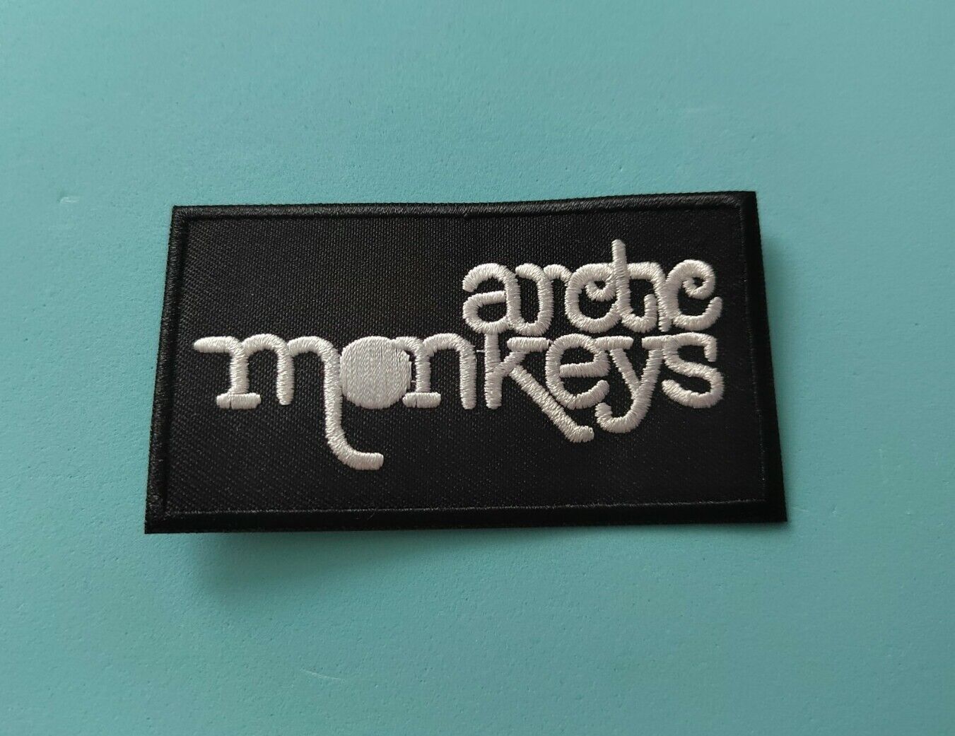 Rock Music Sew / Iron On Embroidered Patch:- Arctic Monkeys (b)