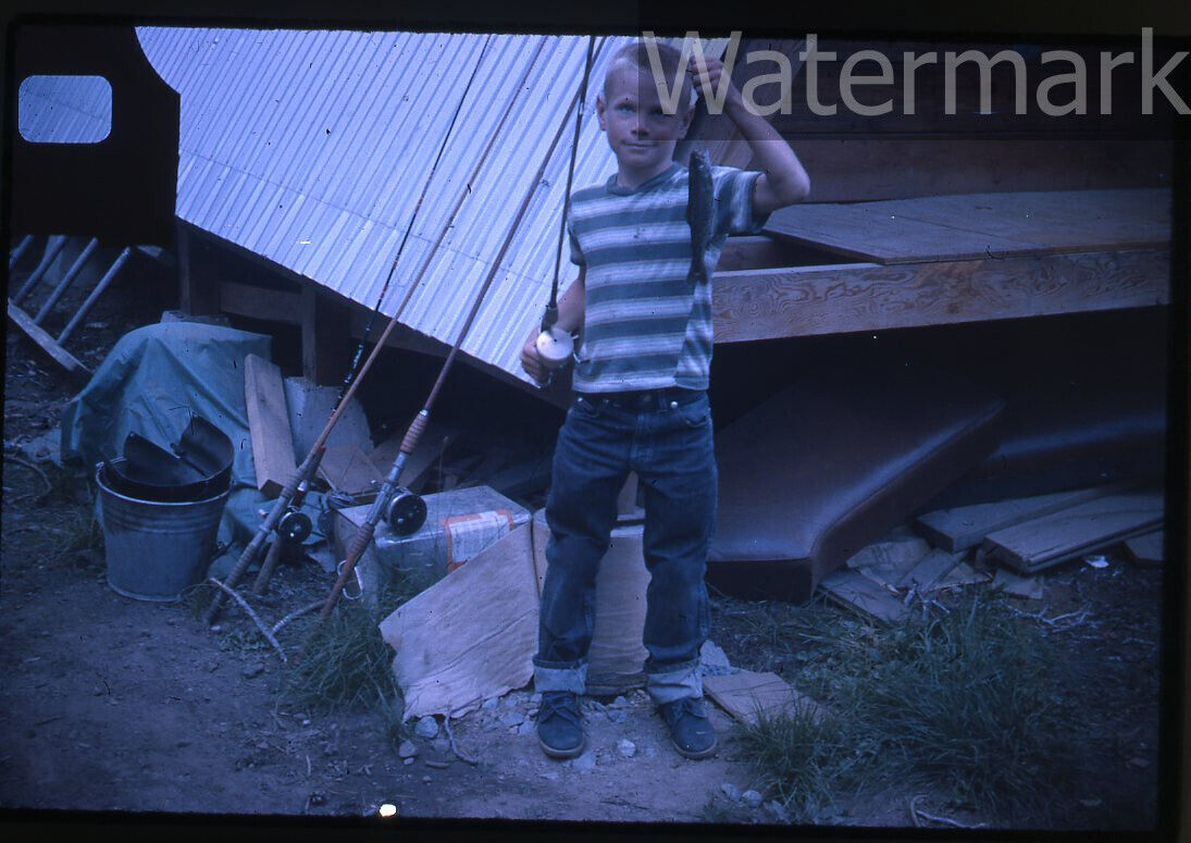 1962 35mm Photo slide  boy with fish  Fishing pole