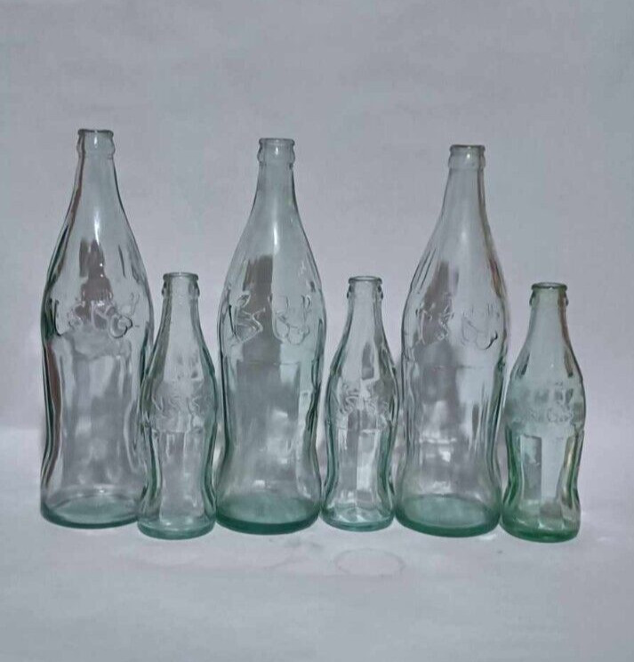 Lot 6 Collection of vintage Coca-Cola bottles of embos arabic writting old clean