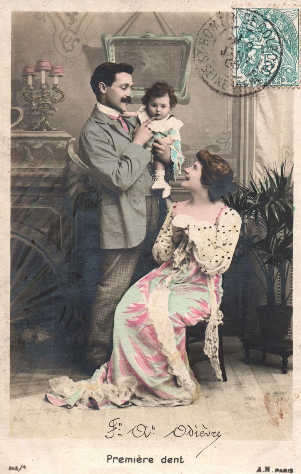 VINTAGE POSTCARD HUSBAND AND WIFE CUDDLING SMALL BABY UNDIVIDED BACK 1905