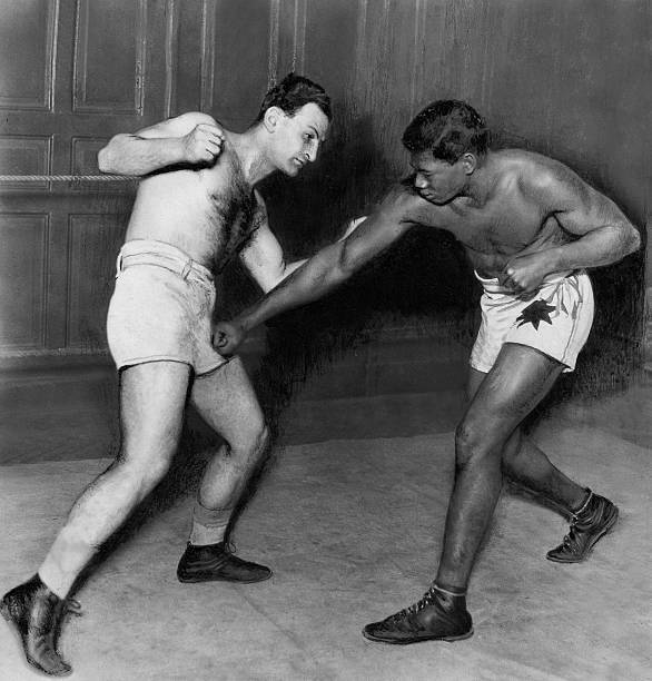 Boxing two boxers demonstrate what is not allowed in boxing low- 1921 Old Photo