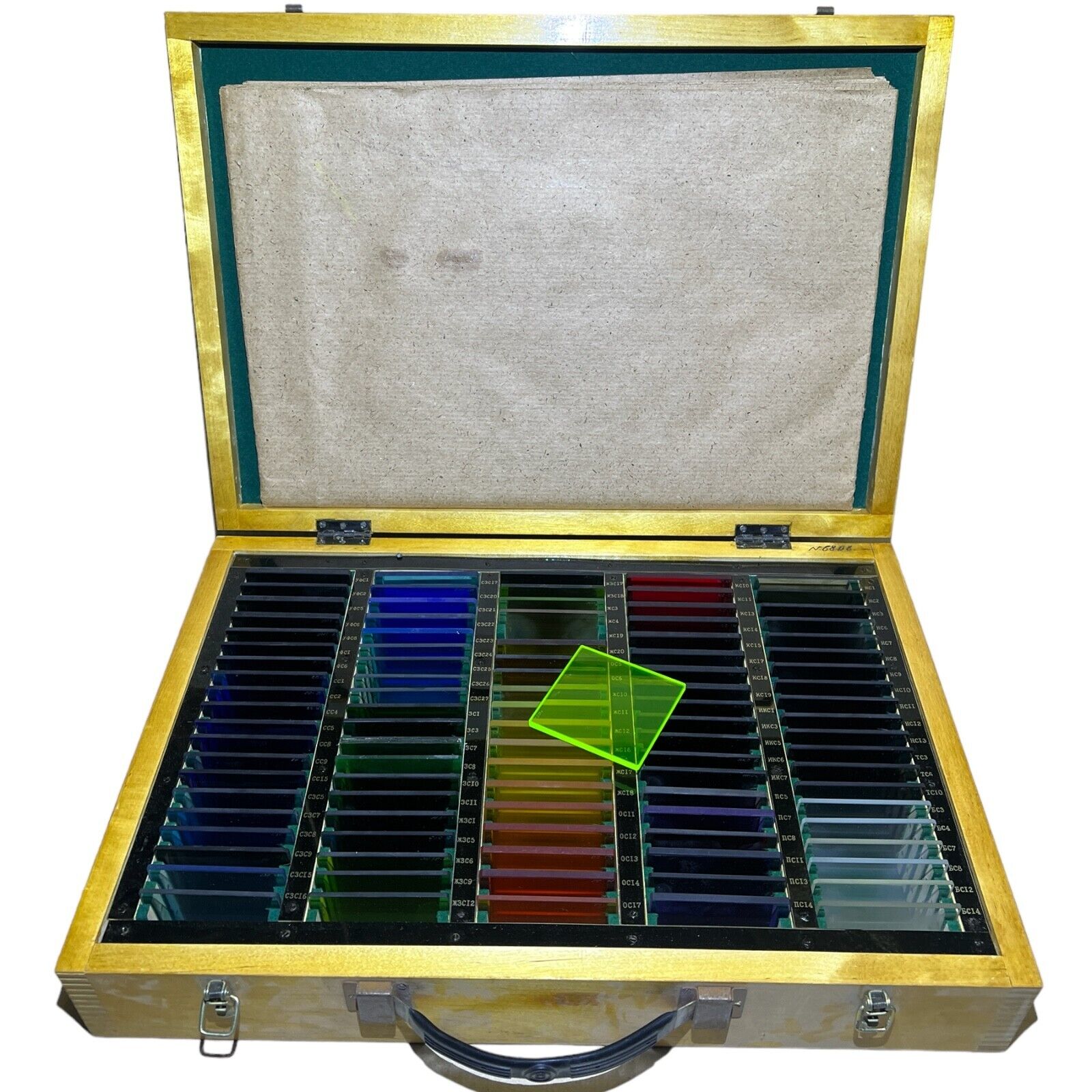 Vintage set of colored optical glasses produced in USSR in a suitcase