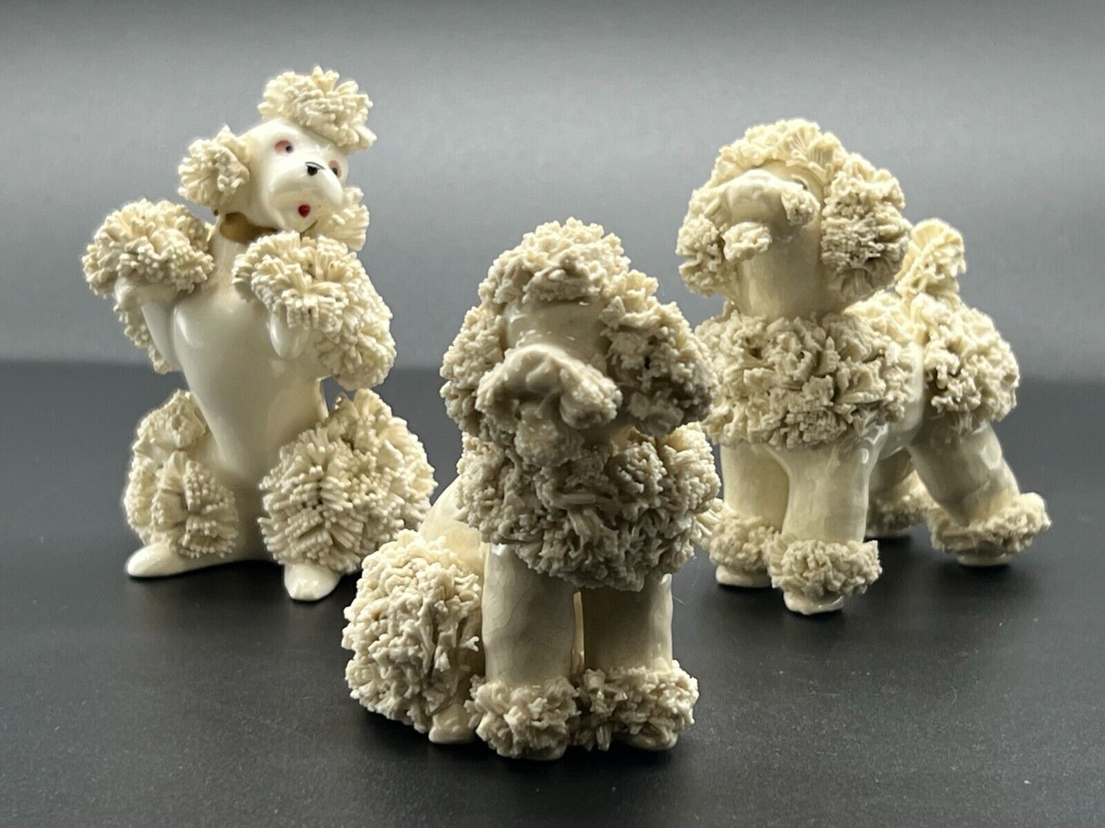 Trio Of Spaghetti Porcelain Poodle Figurine