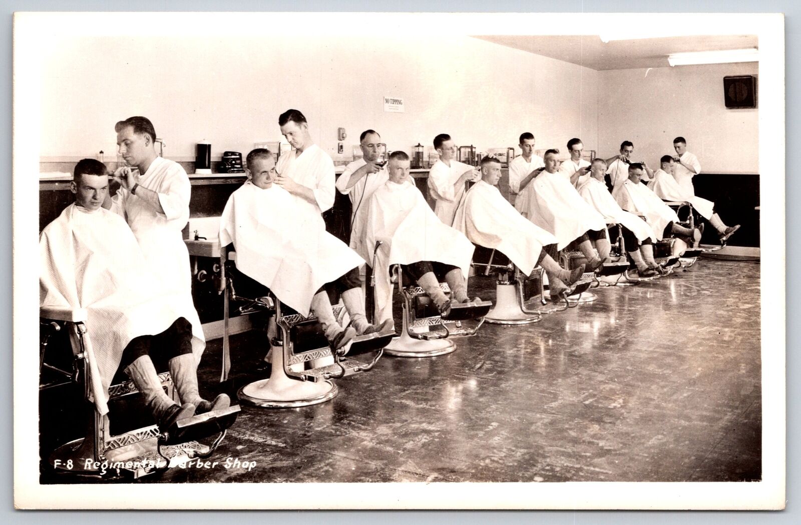Military~Regimental Barber Shop~Recruits Get Hair Cuts~8 Chairs~WWI c1917 RPPC