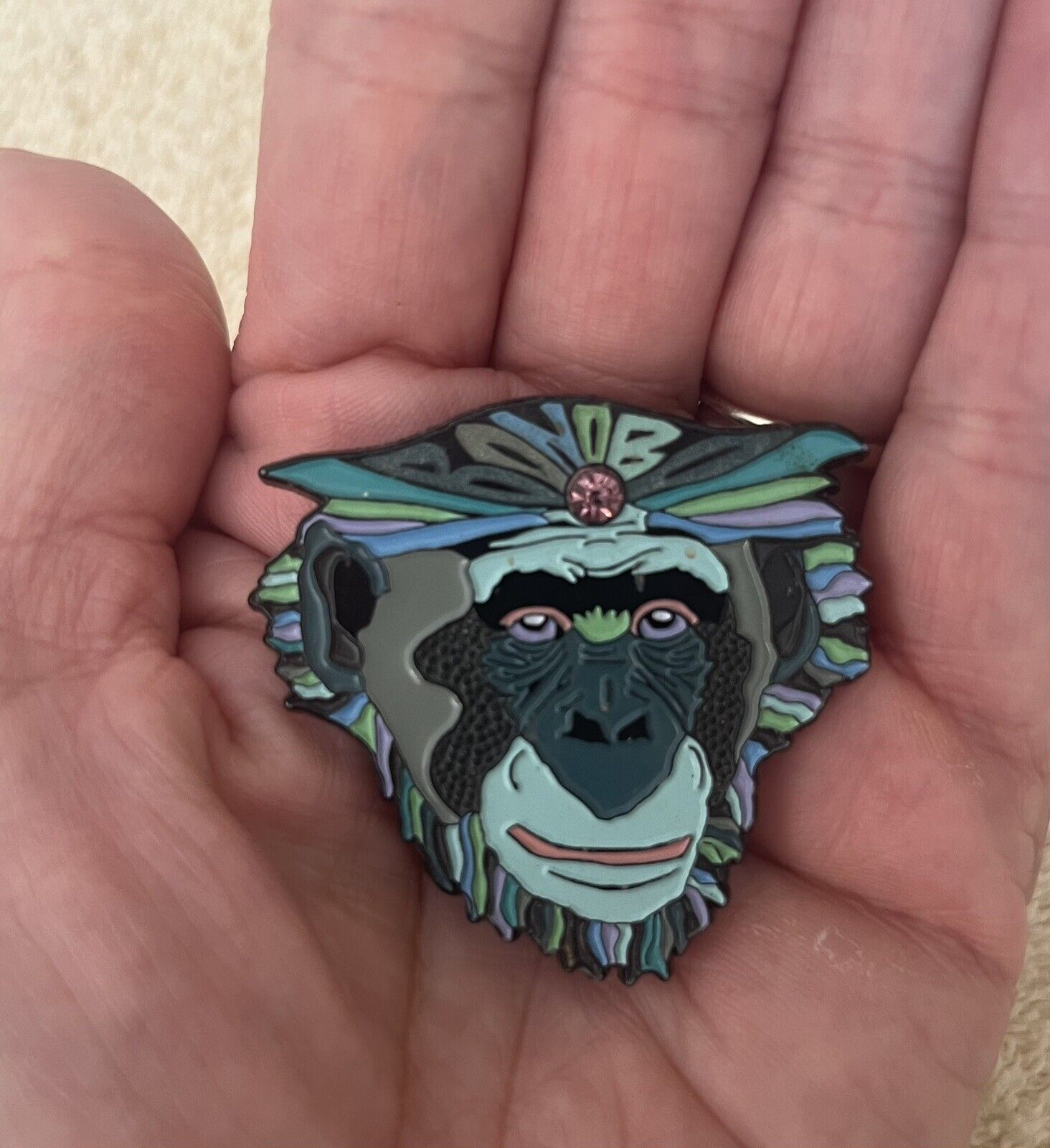 Bonobo glow monkey hat pin with gem