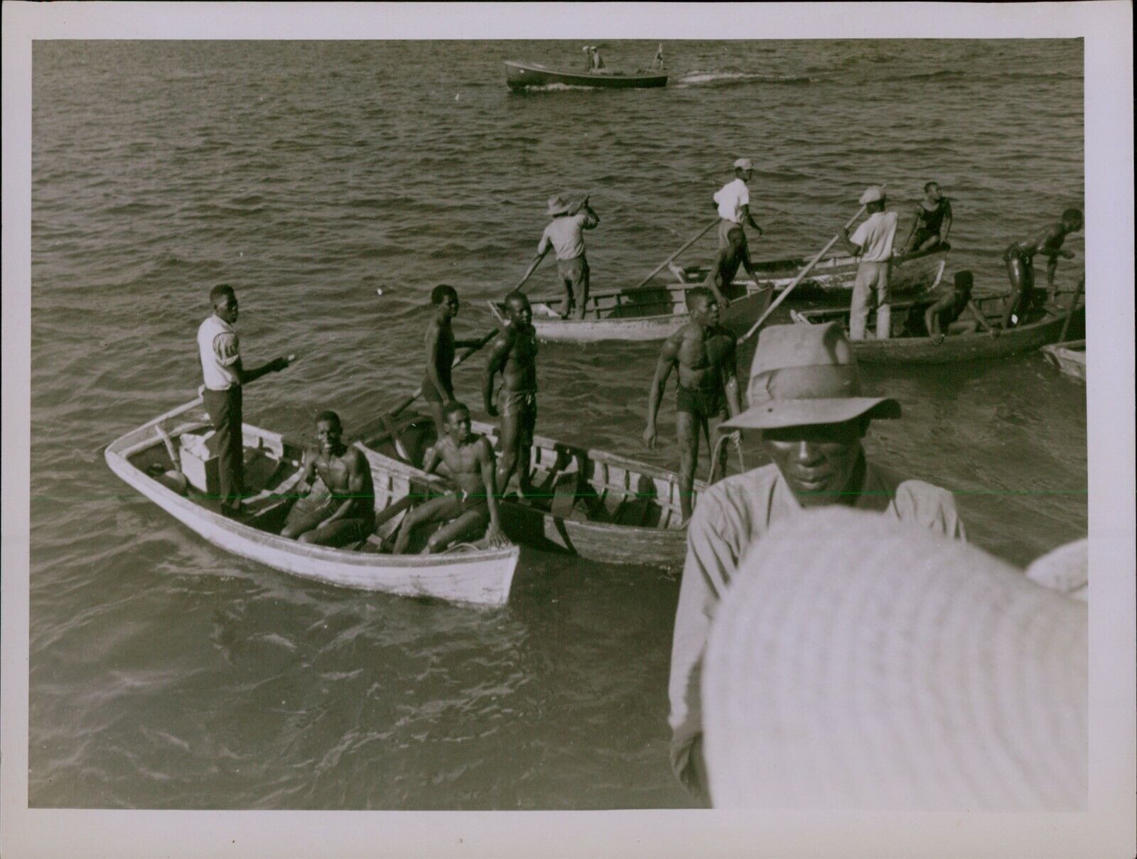 GA60 Original Photo BLACK BOAT WORKERS Manual Laborers Rowing Out to Sea Water