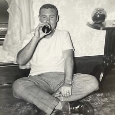 L7 Photograph Handsome Man Drinking Bottle Of Beer Sitting On Floor 1950's picture