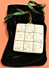 BRAND NEW CHRISTMAS SUDOKU ORNAMENT, PORCELAIN. THIS OPENS UP, GOLD TRIM picture