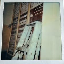 i3 Polaroid Weird Odd Subject Top of Leaning Ladder Construction Abstract Odd  picture