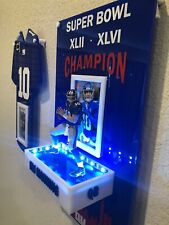 Eli Manning Display w/PSA holders and figurine picture