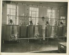 United Dairy man worker in milk processing production plant antique photo picture