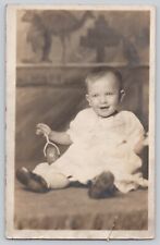 Postcard RPPC Baby with Rattle picture