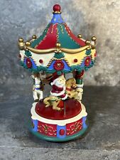 Vintage Avon Santa's Caroling Carousel From 1995 Lights up and Plays Music picture