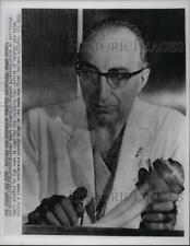 1966 Press Photo Dr. Michael DeBakey holds an artificial heart - mja94439 picture