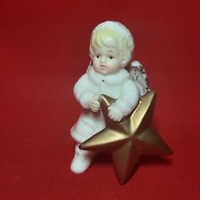 Vintage Grandeur Noel Porcelain Angel Holding a Star Figurine picture