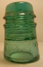 CD 121 B .T .Co. OF CAN. TOLL STYLE GLASS INSULATOR GREEN AQUA WITH AMBER picture
