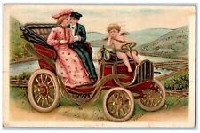 1907 Valentine Couple Romance Cupid Angel Driving Car Embossed Antique Postcard picture