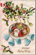 Vintage 1909 CHRISTMAS Postcard Floral Bells / SANTA CLAUS with Bag of Gifts picture