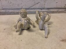 Vintage Porcelian Pair of Playful  Blanc de Chine Unmarked Cherub Figurines picture