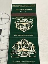 Vintage Matchbook Cover  Dakota Restaurant Steak, Seafood & Smiles  gmg Unstruck picture