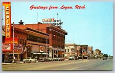 Greetings Logan Utah Street View Old Cars Hotel Signs Movie Theater UNP Postcard picture