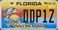 2010 Florida Protect Wild Dolphins License Plate EXPIRED picture