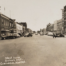 Concordia Kansas Main Street RPPC Postcard 1940s Ford Automobile Mercury KS K614 picture