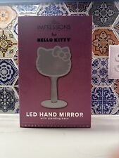 New Impressions Vanity LED Hello Kitty Handheld Standing Base Makeup Mirror picture