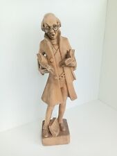 Book lover figure wooden statue vintage. Ukraine picture